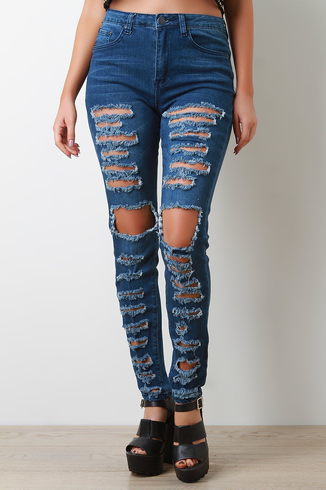 Mid Rise Destroyed Denim Skinny Jeans