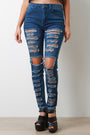 Mid Rise Destroyed Denim Skinny Jeans
