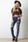 Mid Rise Destroyed Denim Skinny Jeans